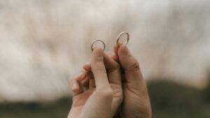 holding marriage rings